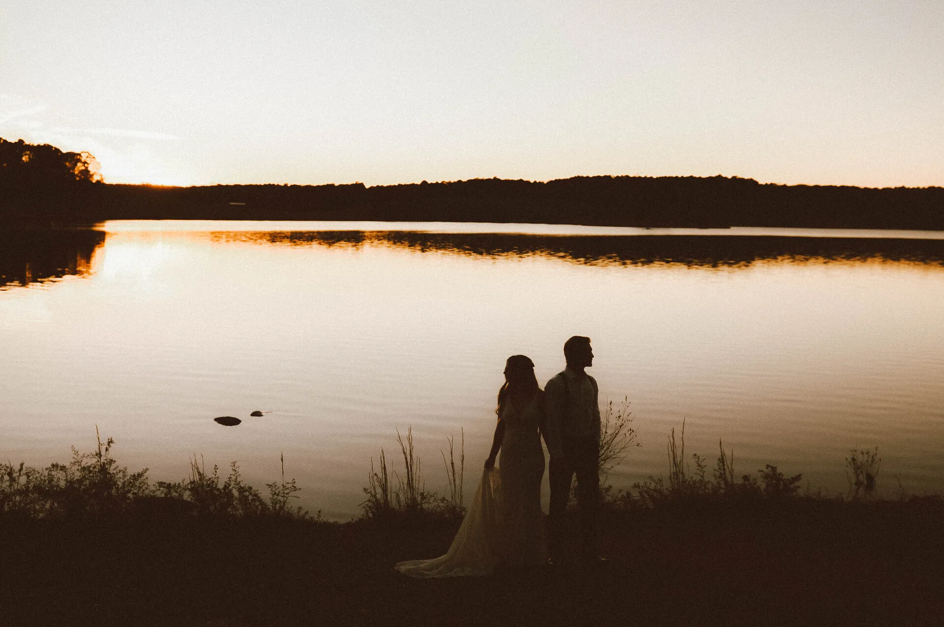 Couple standing by water